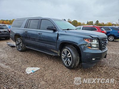 Czwarte zdjęcie samochodu z boku: 2020 CHEVROLET SUBURBAN K1500 PREMIER VIN:1GNSKJKJ2LR105404 - miniatura
