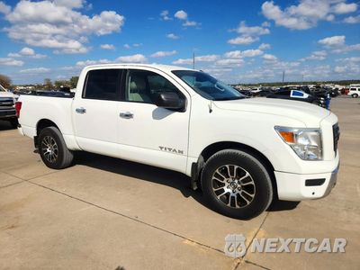 Czwarte zdjęcie samochodu z boku: 2021 NISSAN TITAN SV VIN:1N6AA1ED6MN502486 - miniatura
