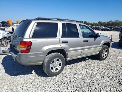 Trzecie zdjęcie samochodu z tyłu: 1999 JEEP GRAND CHEROKEE LAREDO VIN:1J4GW58S4XC600250 - miniatura