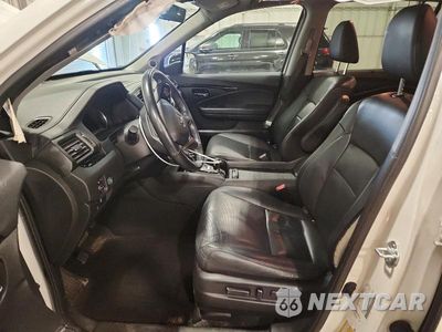 Zdjęcie 7 z 13 samochodu: 2022 HONDA PILOT ELITE VIN:5FNYF6H04NB037117 - miniatura