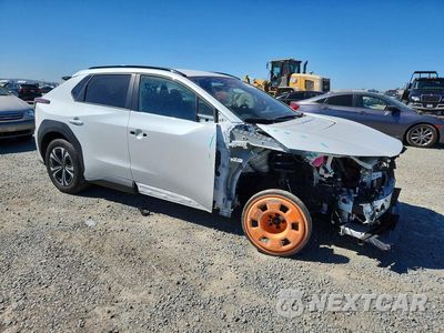 Czwarte zdjęcie samochodu z boku: 2024 SUBARU SOLTERRA PREMIUM VIN:JTMABABA6RA069390 - miniatura
