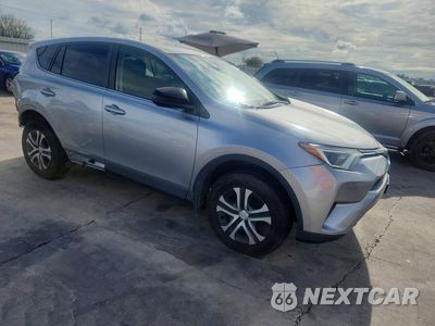 Czwarte zdjęcie samochodu z boku: 2018 TOYOTA RAV4 LE VIN:JTMBFREV2JJ257737 - miniatura