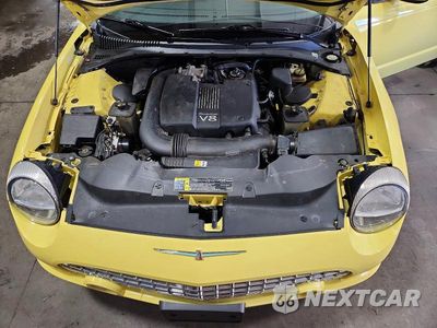 Zdjęcie 11 z 12 samochodu: 2002 FORD THUNDERBIRD VIN:1FAHP60A32Y102526 - miniatura