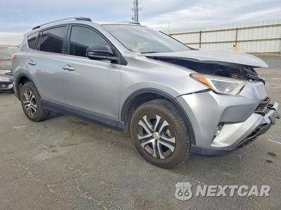 Czwarte zdjęcie samochodu z boku: 2018 TOYOTA RAV4 LE VIN:JTMZFREV7JJ175517 - miniatura