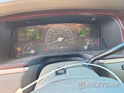 Zdjęcie 9 z 12 samochodu: 2004 LINCOLN TOWN CAR EXECUTIVE VIN:1LNHM81W14Y644733 - miniatura