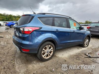 Trzecie zdjęcie samochodu z tyłu: 2018 FORD ESCAPE SE VIN:1FMCU9G98JUC88205 - miniatura