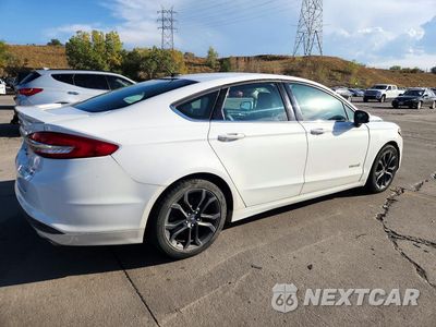 Trzecie zdjęcie samochodu z tyłu: 2018 FORD FUSION SE HYBRID VIN:3FA6P0LU8JR248914 - miniatura