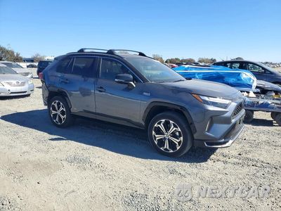 Czwarte zdjęcie samochodu z boku: 2023 TOYOTA RAV4 PRIME XSE VIN:JTMFB3FV3PD159462 - miniatura
