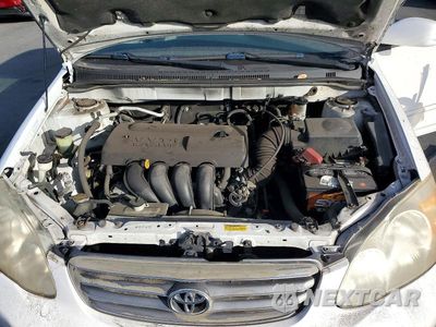 Zdjęcie 11 z 12 samochodu: 2004 TOYOTA COROLLA LE VIN:1NXBR32E64Z274970 - miniatura