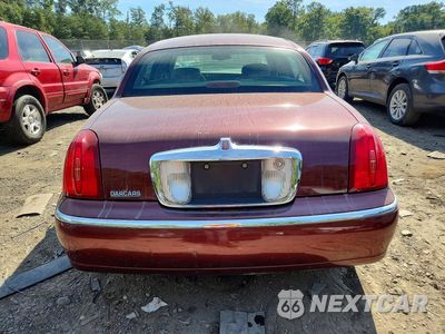 Zdjęcie 6 z 12 samochodu: 2002 LINCOLN TOWN CAR EXECUTIVE VIN:1LNHM81WX2Y609069 - miniatura