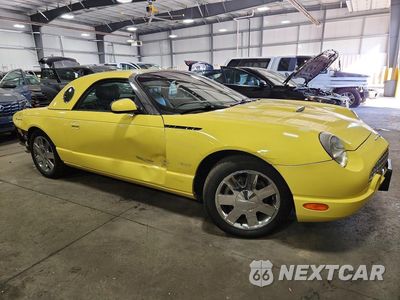 Czwarte zdjęcie samochodu z boku: 2002 FORD THUNDERBIRD VIN:1FAHP60A32Y102526 - miniatura
