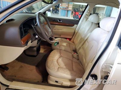 Zdjęcie 7 z 12 samochodu: 1998 LINCOLN CONTINENTAL VIN:1LNFM97V9WY662508 - miniatura