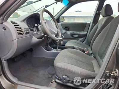 Zdjęcie 7 z 12 samochodu: 2002 HYUNDAI ACCENT GL VIN:KMHCG45C02U282277 - miniatura