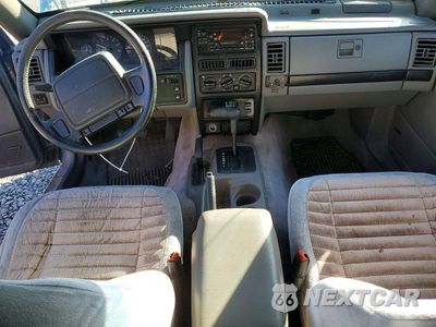 Zdjęcie 8 z 13 samochodu: 1995 JEEP GRAND CHEROKEE LAREDO VIN:1J4GZ58YXSC765157 - miniatura