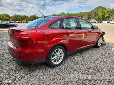 Trzecie zdjęcie samochodu z tyłu: 2016 FORD FOCUS SE VIN:1FADP3F23GL306194 - miniatura
