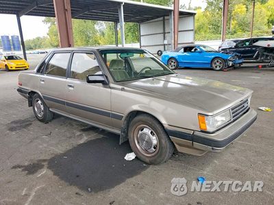 Czwarte zdjęcie samochodu z boku: 1986 TOYOTA CAMRY LE VIN:JT2SV16E2G0517886 - miniatura