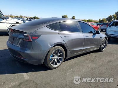 Trzecie zdjęcie samochodu z tyłu: 2021 TESLA MODEL 3 VIN:5YJ3E1EA1MF007259 - miniatura