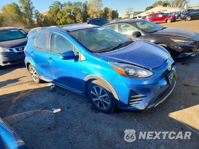 Czwarte zdjęcie samochodu z boku: 2018 TOYOTA PRIUS C ONE VIN:JTDKDTB32J1602951 - miniatura