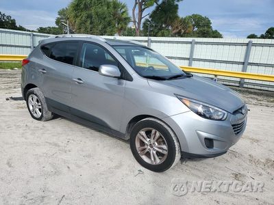 Czwarte zdjęcie samochodu z boku: 2010 HYUNDAI TUCSON GLS VIN:KM8JU3AC8AU017816 - miniatura