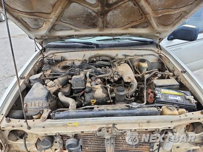 Zdjęcie 11 z 12 samochodu: 2003 TOYOTA TACOMA PRERUNNER VIN:5TEGM92N83Z162687 - miniatura