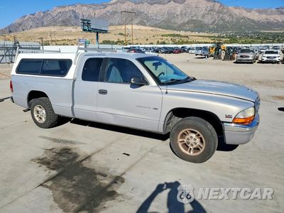Czwarte zdjęcie samochodu z boku: 1999 DODGE DAKOTA SPORT VIN:1B7GL22X3XS118103 - miniatura