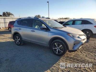 Czwarte zdjęcie samochodu z boku: 2016 TOYOTA RAV4 XLE VIN:2T3WFREV4GW237193 - miniatura