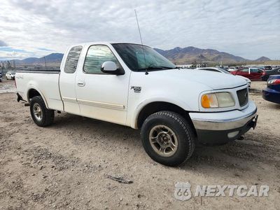Czwarte zdjęcie samochodu z boku: 2001 FORD F150 VIN:1FTRX18W31NA50445 - miniatura