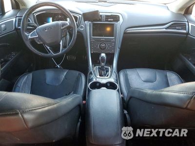 Zdjęcie 8 z 12 samochodu: 2015 FORD FUSION TITANIUM PHEV VIN:3FA6P0SUXFR247790 - miniatura