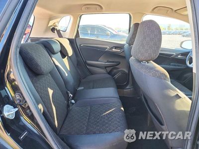 Zdjęcie 10 z 13 samochodu: 2016 HONDA FIT LX VIN:JHMGK5H57GX026603 - miniatura