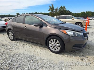 Czwarte zdjęcie samochodu z boku: 2014 KIA FORTE LX VIN:KNAFX4A6XE5096887 - miniatura
