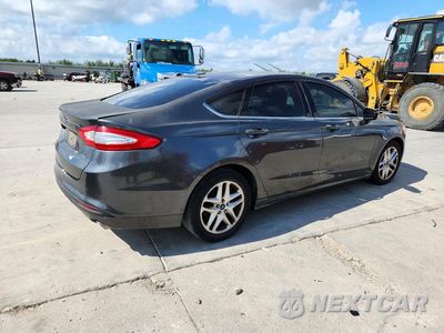 Trzecie zdjęcie samochodu z tyłu: 2016 FORD FUSION SE VIN:3FA6P0H74GR302172 - miniatura