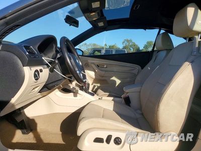 Zdjęcie 7 z 12 samochodu: 2015 VOLKSWAGEN EOS KOMFORT VIN:WVWBW8AH1FV000577 - miniatura