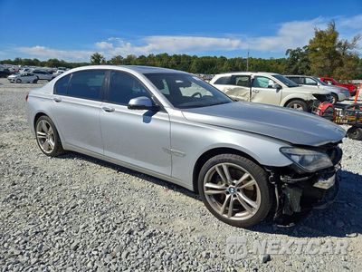 Czwarte zdjęcie samochodu z boku: 2014 BMW 740 LI VIN:WBAYE4C52ED138218 - miniatura
