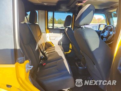 Zdjęcie 11 z 14 samochodu: 2015 JEEP WRANGLER UNLIMITED SPORT VIN:1C4BJWDG9FL711106 - miniatura