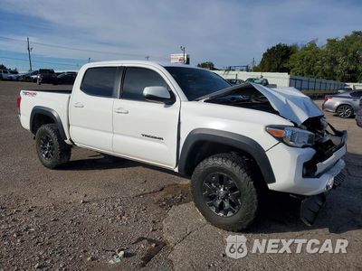 Czwarte zdjęcie samochodu z boku: 2019 TOYOTA TACOMA TRD OFF-ROAD VIN:3TMCZ5AN1KM239731 - miniatura