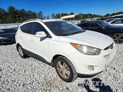 Czwarte zdjęcie samochodu z boku: 2013 HYUNDAI TUCSON GLS VIN:KM8JU3ACXDU593122 - miniatura