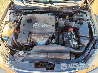 Zdjęcie 11 z 12 samochodu: 2003 NISSAN ALTIMA 2.5 S VIN:1N4AL11E43C321625 - miniatura