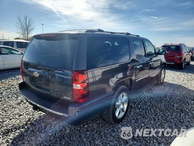 Trzecie zdjęcie samochodu z tyłu: 2010 CHEVROLET SUBURBAN K1500 LTZ VIN:1GNUKKE36AR103826 - miniatura