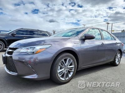 2015 TOYOTA CAMRY HYBRID SE 4T1BD1FK7FU163155 - główne zdjęcie licytacji z USA - miniatura