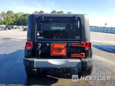 Zdjęcie 6 z 13 samochodu: 2010 JEEP WRANGLER SAHARA VIN:1J4GA5D16AL181403 - miniatura