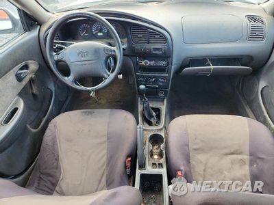 Zdjęcie 8 z 12 samochodu: 2004 KIA SPECTRA BASE VIN:KNAFB121845312735 - miniatura
