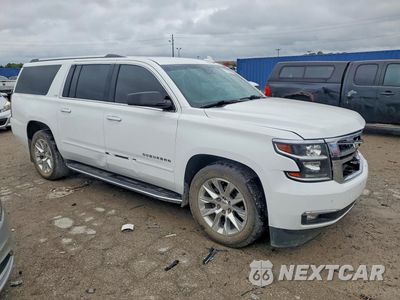 Czwarte zdjęcie samochodu z boku: 2016 CHEVROLET SUBURBAN K1500 LTZ VIN:1GNSKJKC8GR291411 - miniatura