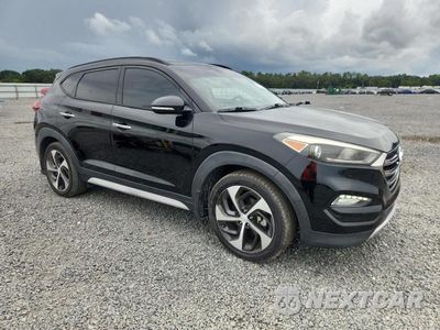Czwarte zdjęcie samochodu z boku: 2017 HYUNDAI TUCSON LIMITED VIN:KM8J33A29HU480598 - miniatura
