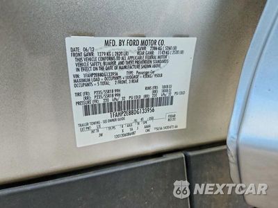 Zdjęcie 12 z 12 samochodu: 2013 FORD TAURUS SEL VIN:1FAHP2E88DG133956 - miniatura
