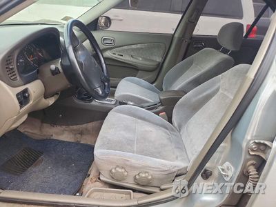 Zdjęcie 7 z 12 samochodu: 2002 NISSAN SENTRA XE VIN:3N1CB51D52L667760 - miniatura