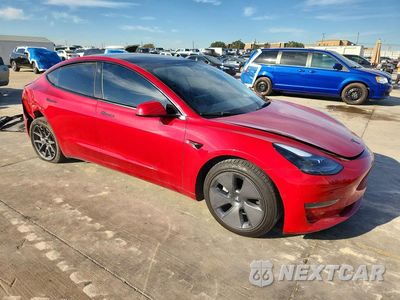Czwarte zdjęcie samochodu z boku: 2022 TESLA MODEL 3 VIN:5YJ3E1EA3NF361575 - miniatura