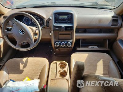 Zdjęcie 8 z 13 samochodu: 2002 HONDA CR-V LX VIN:JHLRD68452C006788 - miniatura