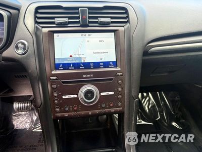 Zdjęcie 9 z 11 samochodu: 2019 FORD FUSION TITANIUM VIN:3FA6P0SU4KR227819 - miniatura