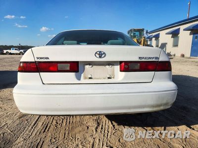 Zdjęcie 6 z 12 samochodu: 1999 TOYOTA CAMRY LE VIN:JT2BG22K9X0377055 - miniatura