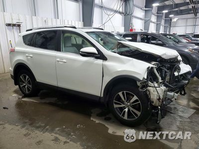 Czwarte zdjęcie samochodu z boku: 2018 TOYOTA RAV4 XLE VIN:JTMRFREV4JJ186331 - miniatura